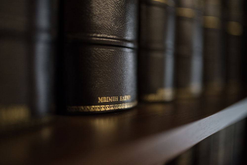 Spine of a leather-bound law volume bearing the name Bimpi